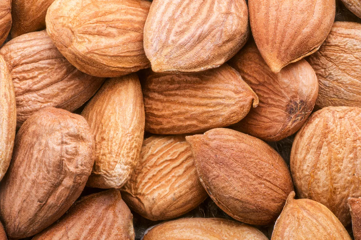 Almonds beside diced vegetables
