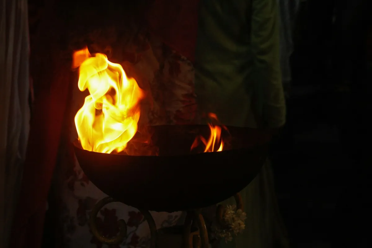 Aromatics dropped into hot oil in a wok