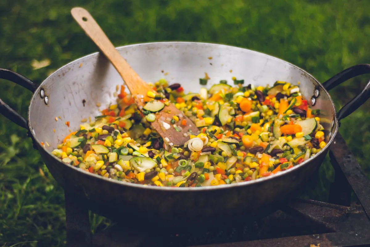 A stir-fry with many different vegetables and proteins
