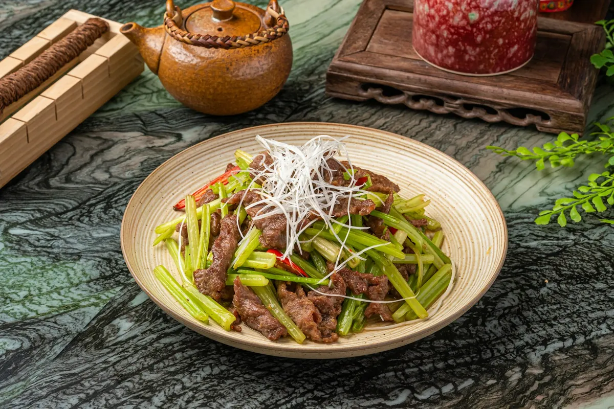 Beef and broccoli served on a plate