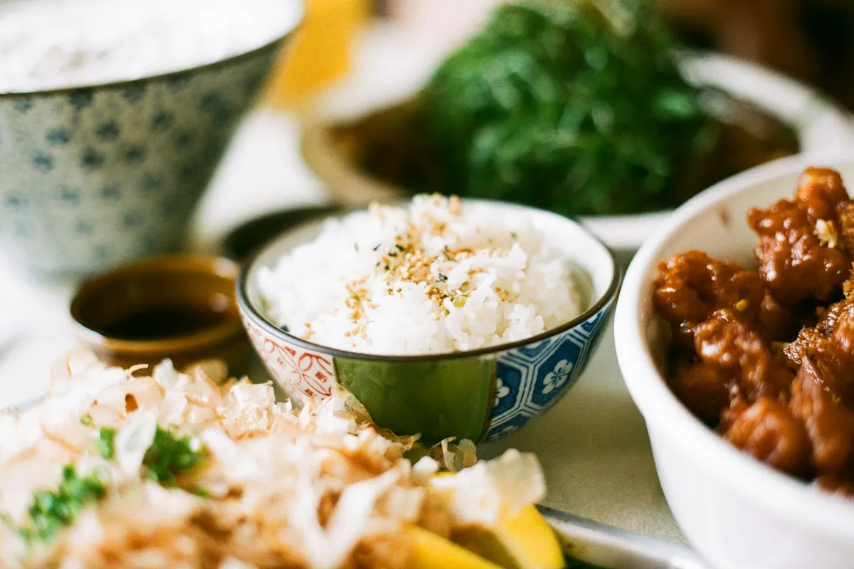 A cashew dish among other dishes on a table