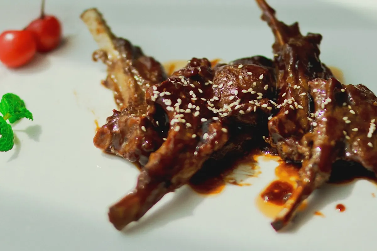 A chicken dish served among other Chinese dishes