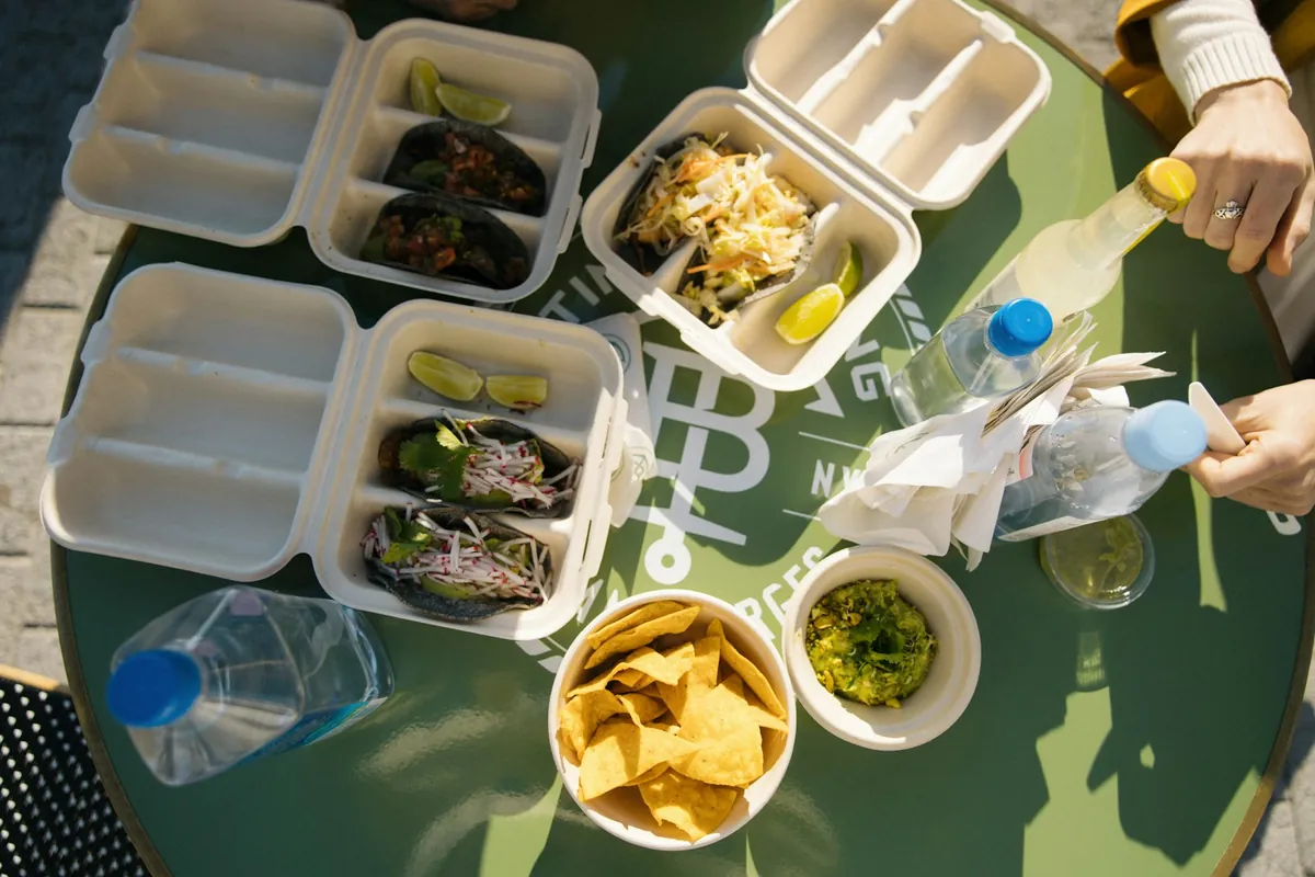 A sauced chicken dish in a takeout container