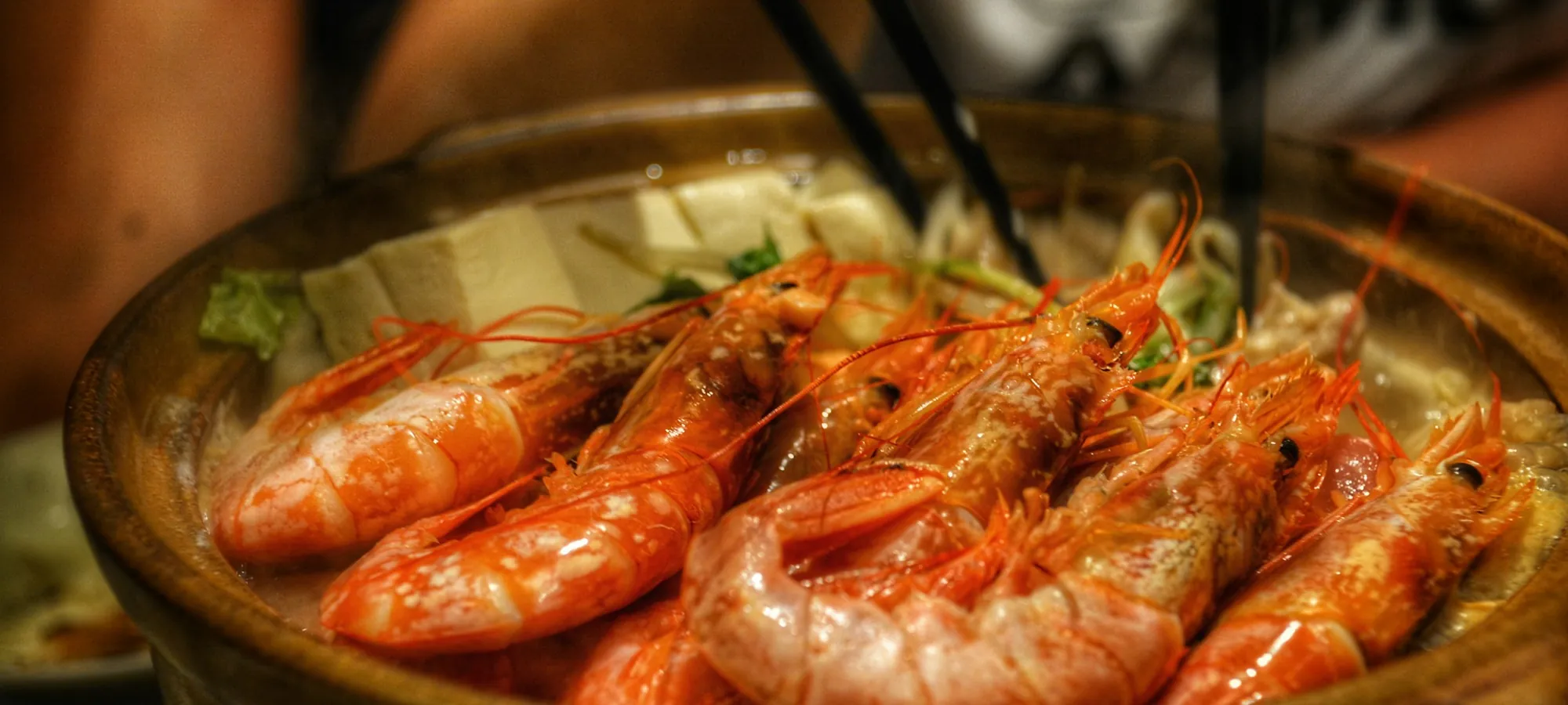 Cooked shrimp served in a ceramic bowl