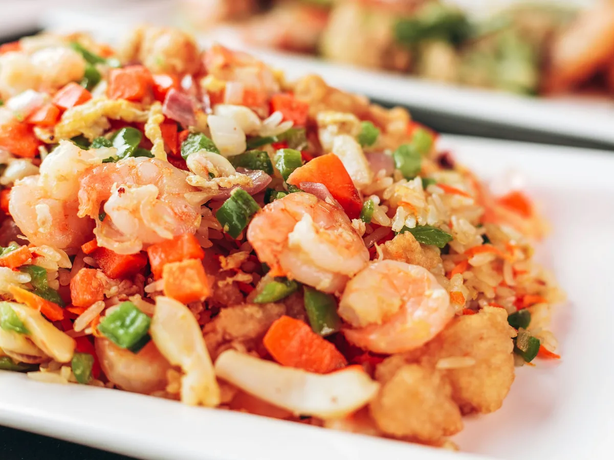 A plate of shellfish with vegetables