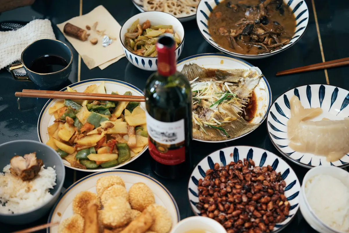 A group meal of Chinese food served at home