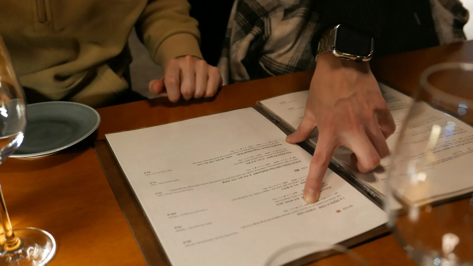 A Chinese restaurant menu open on a table