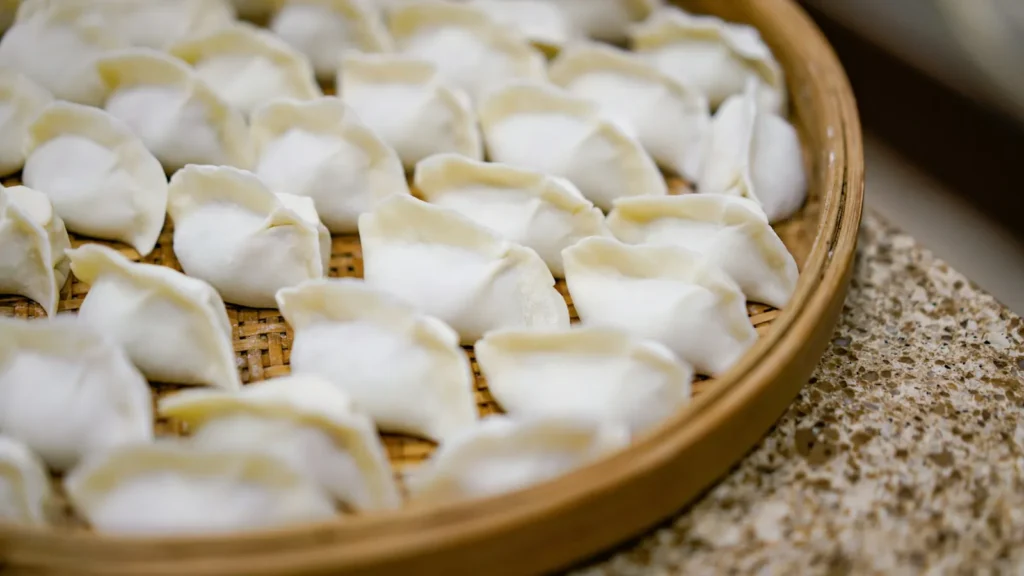 A spread of different Chinese takeout dishes on a table