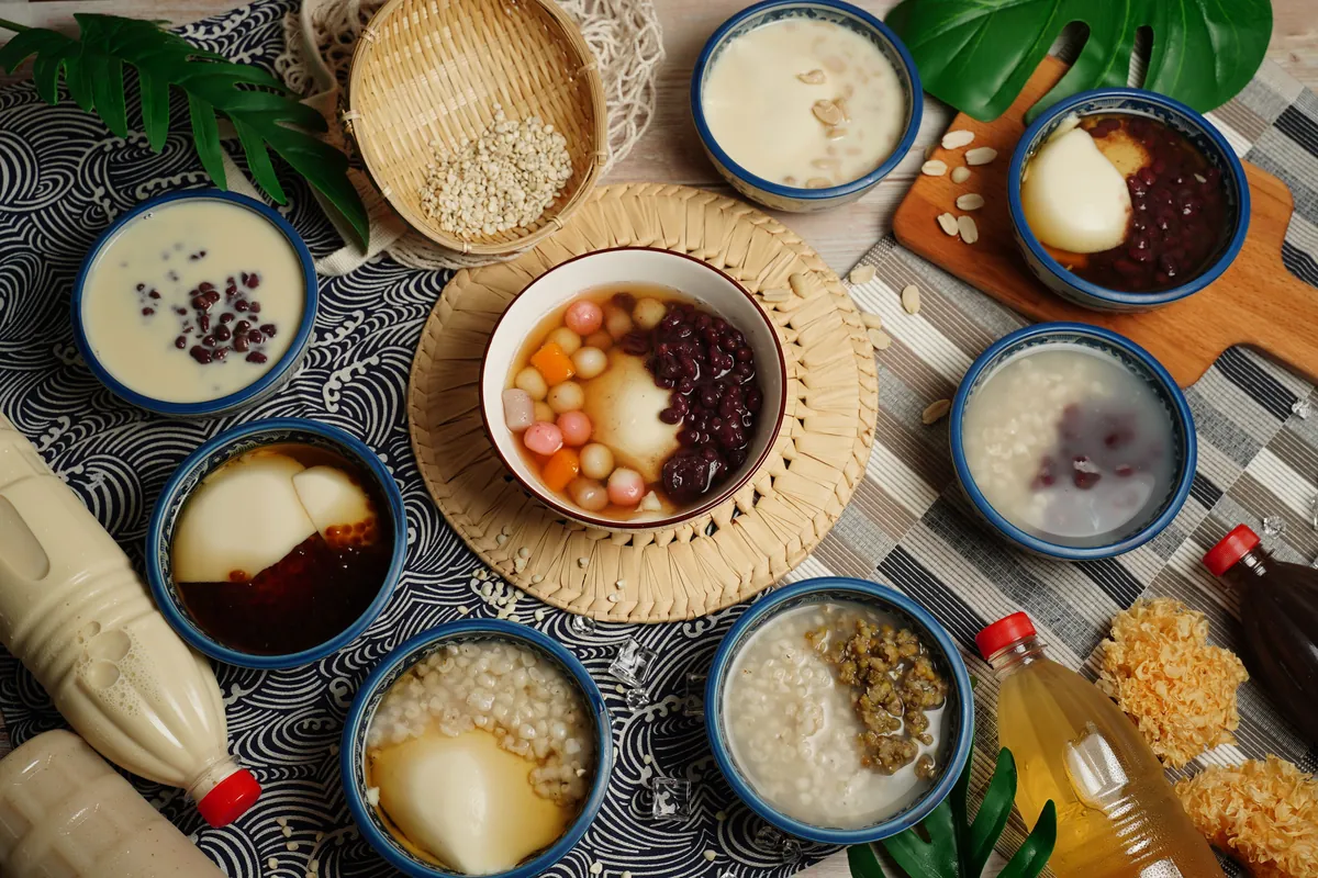 Congee topped with pieces of preserved egg
