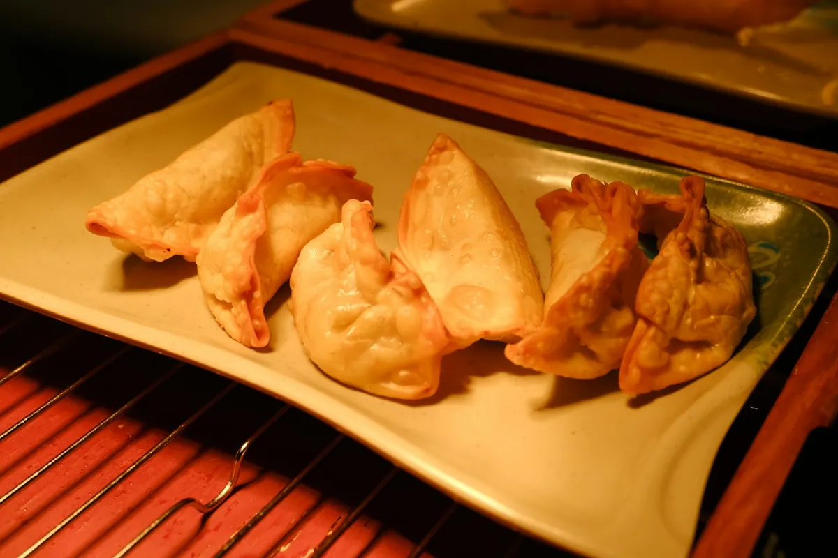 Crisp fried wontons on a plate