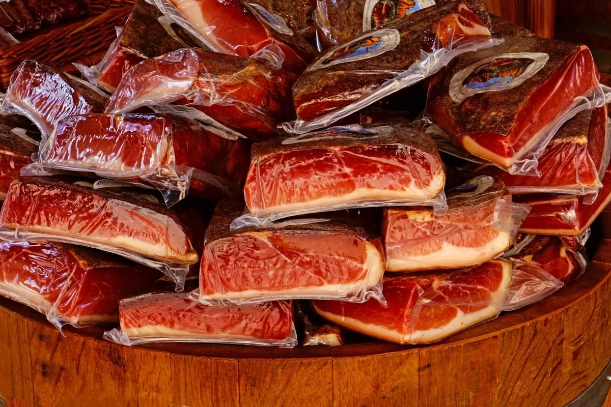 Vacuum-packed cured meat in a refrigerator