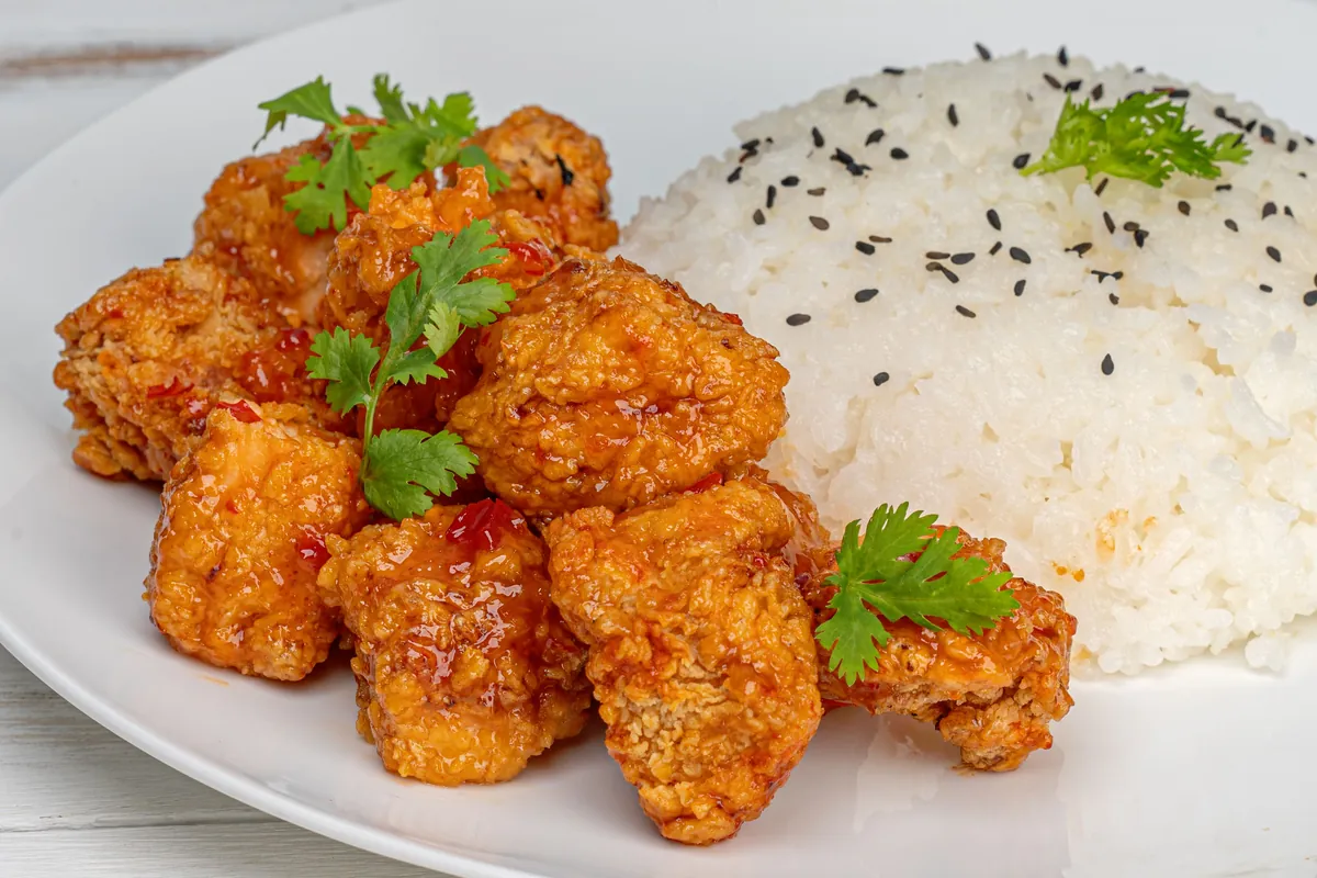 Diced chicken cooked with chilies and nuts