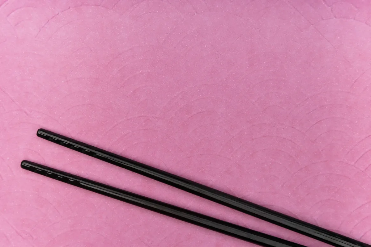 Disposable bamboo chopsticks still joined at the base