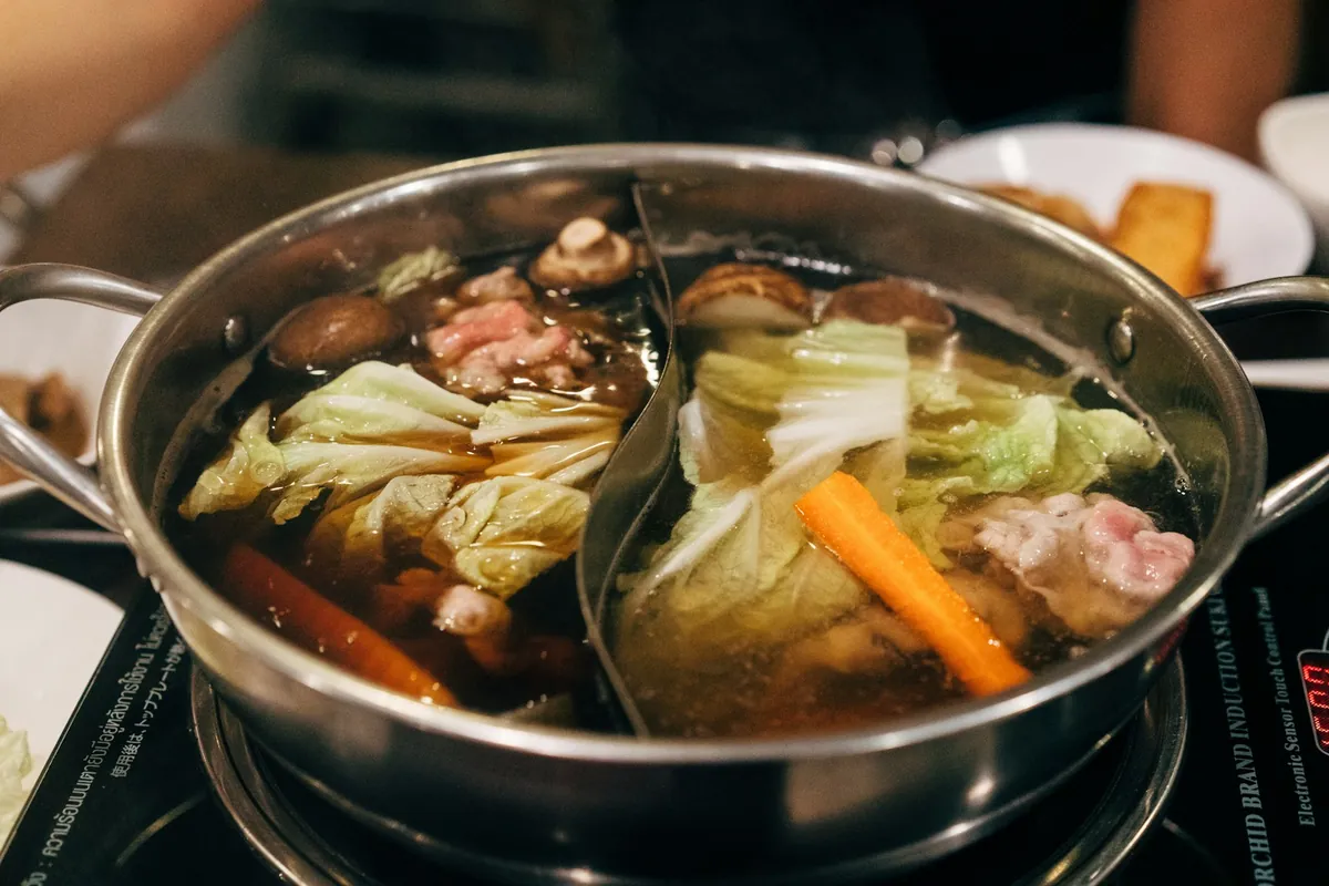 A divided hot pot with two different broths