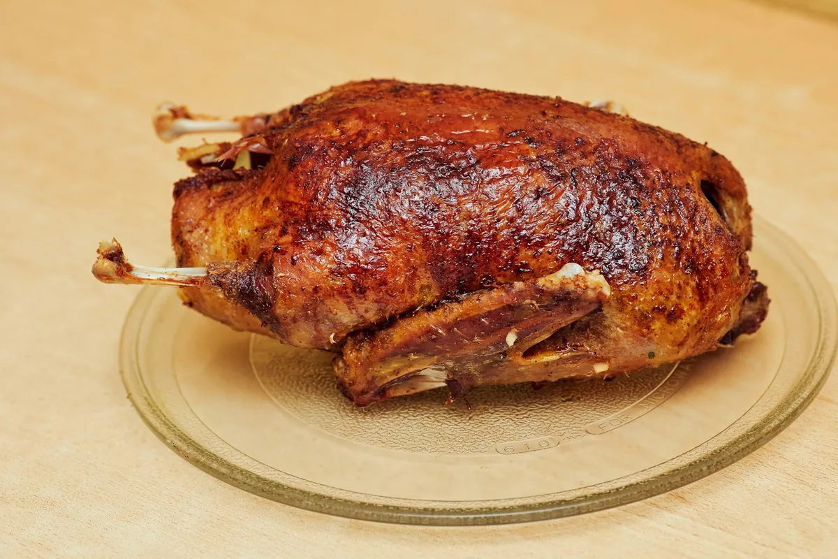 A duck being carved