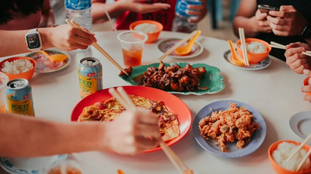 A family sharing a mild Chinese meal at a table