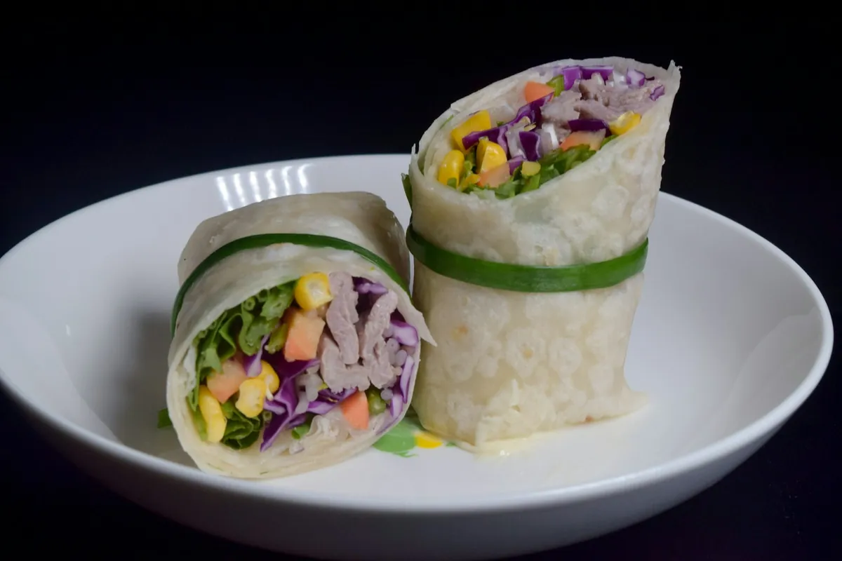 A thin pancake filled and rolled into a wrap