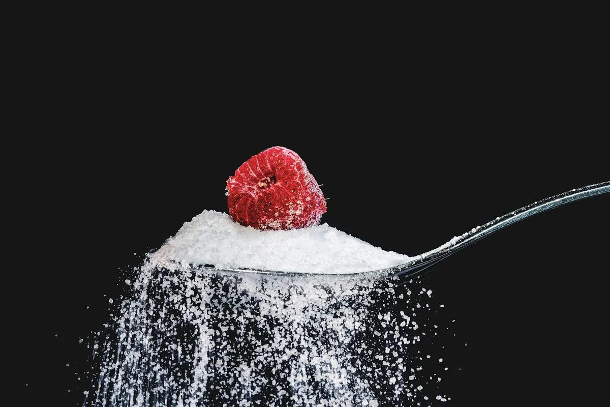Flour, sugar and eggs laid out for baking