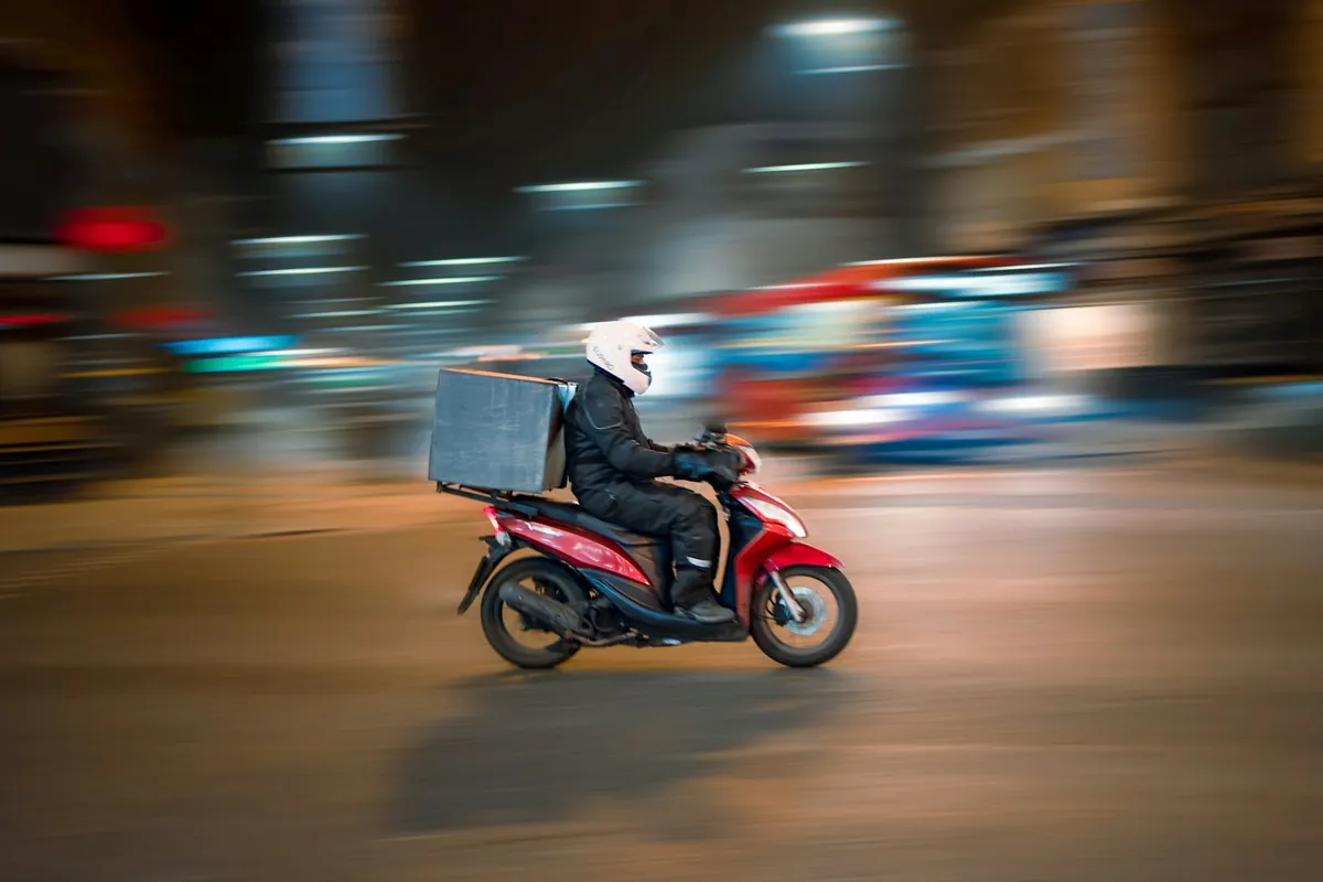 A food delivery order being carried