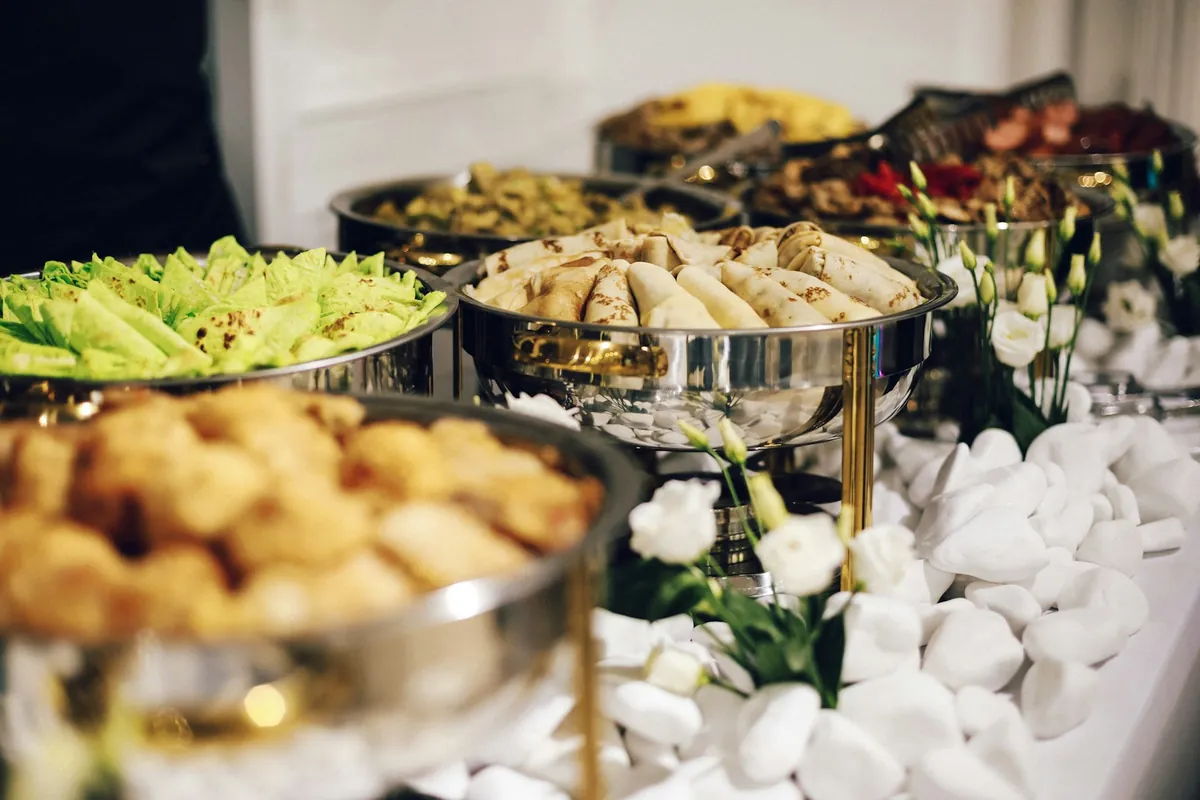 Food held warm in a serving tray