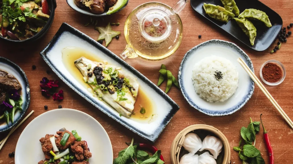A rice dish and a noodle dish served side by side