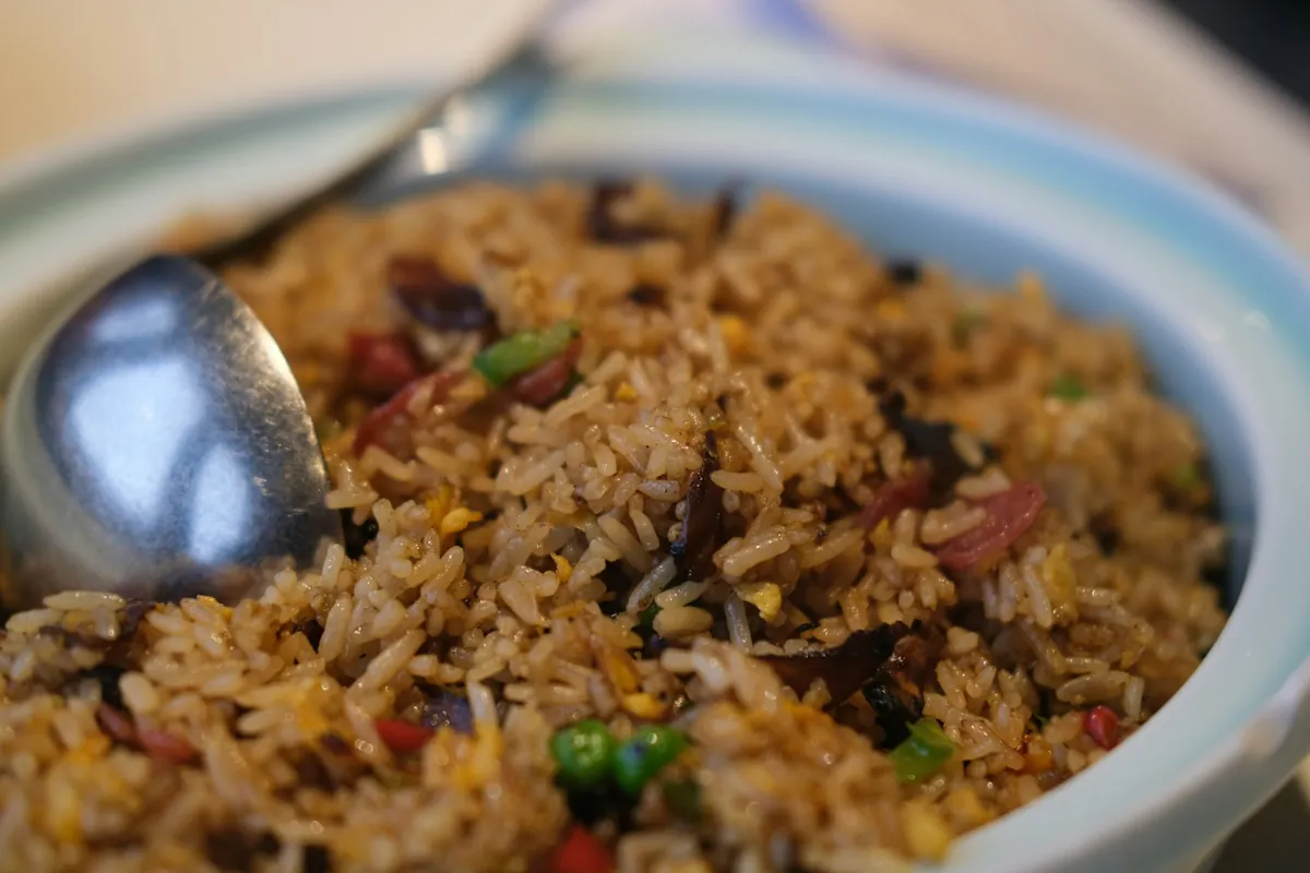 Fried rice with pieces of sausage through it