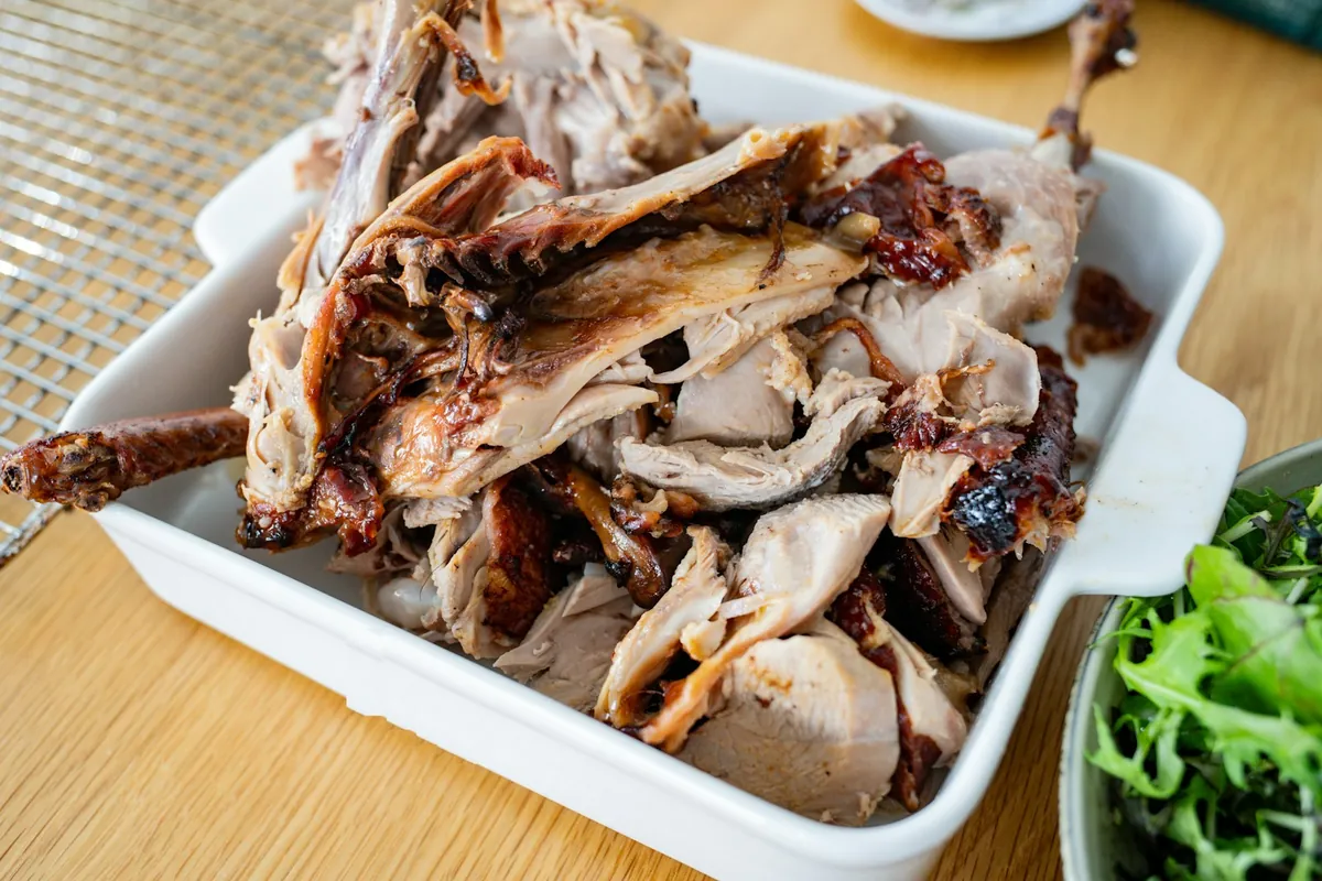 Close view of glazed, crisp duck skin