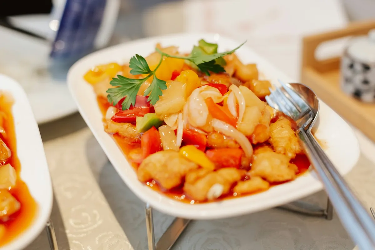 A glossy savory sauce coating a stir-fried dish