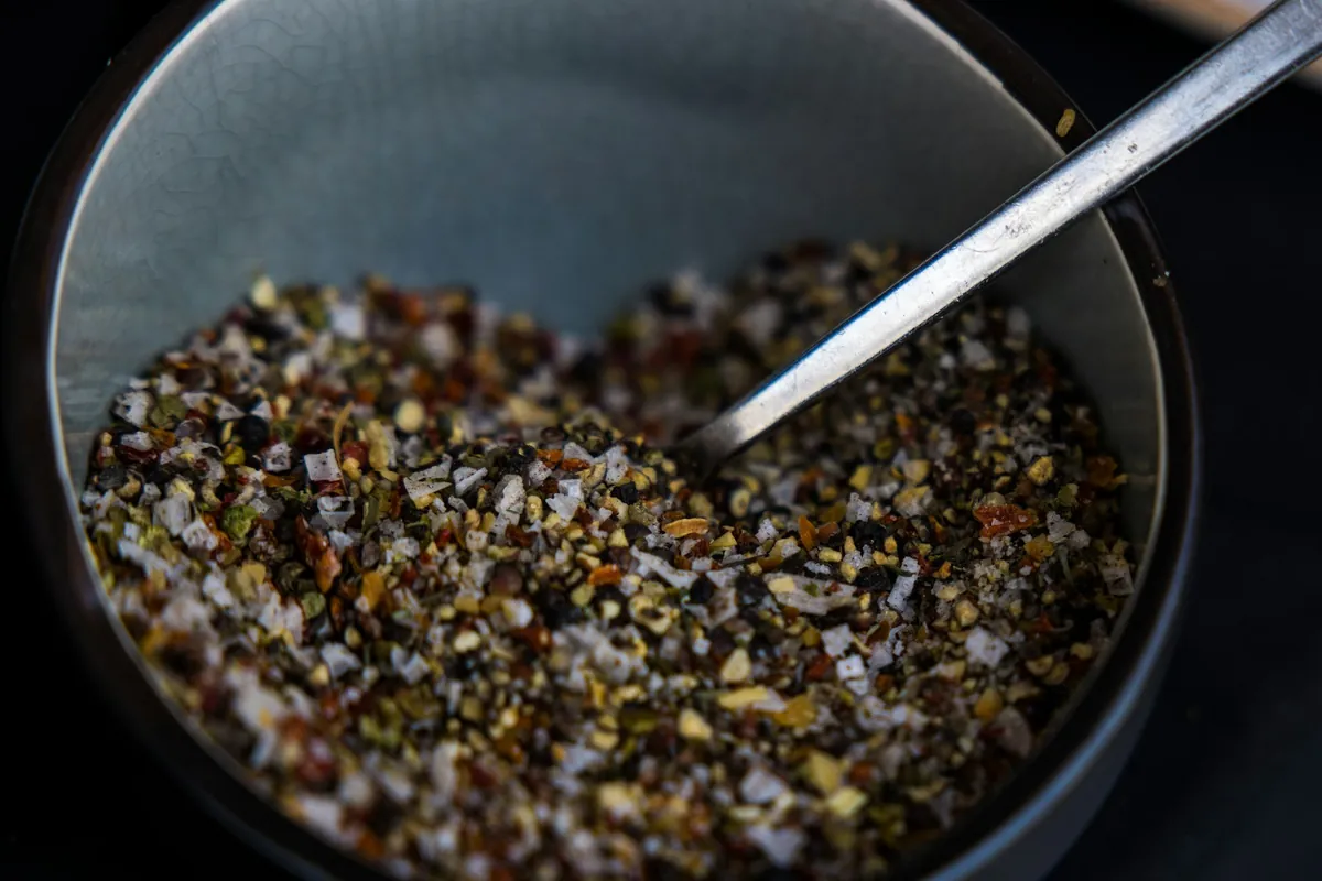 A close view of a ground brown spice blend