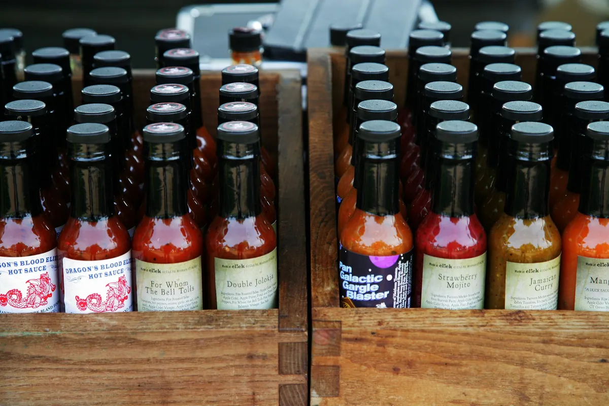 Two soy sauce bottles of different shades side by side
