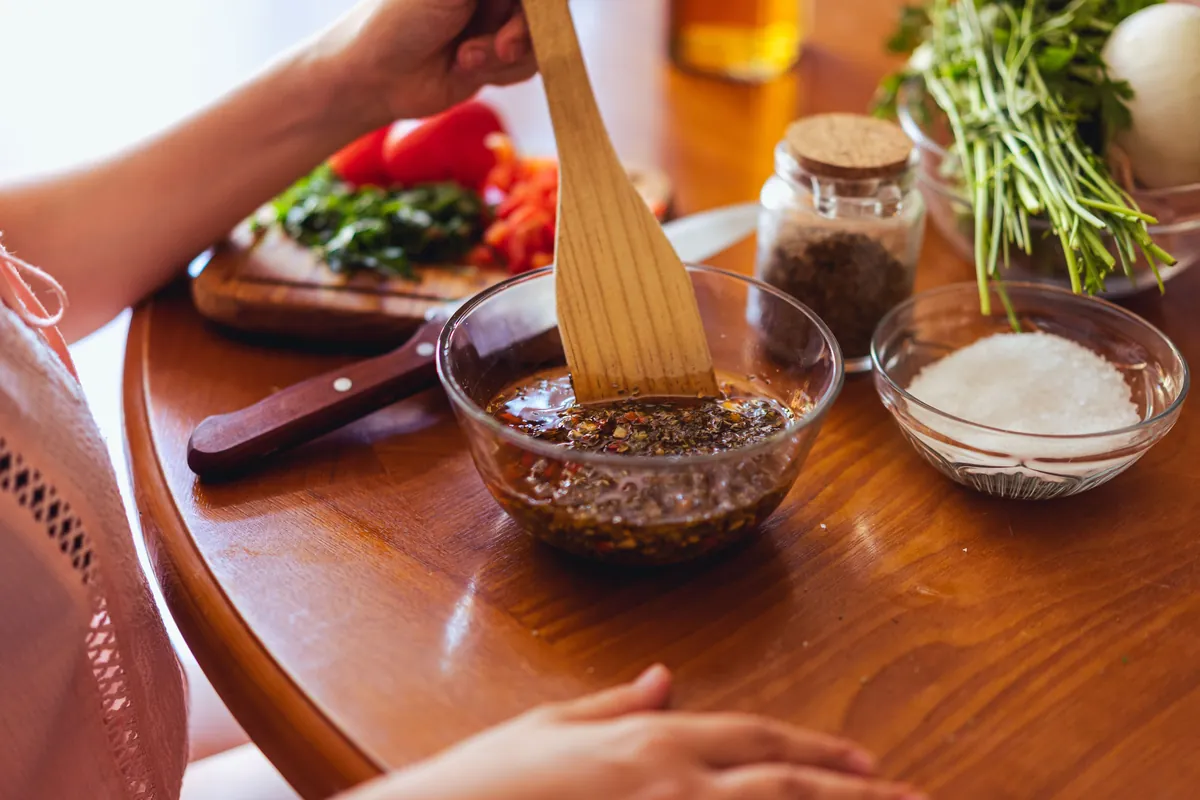 Meat marinating in a bowl