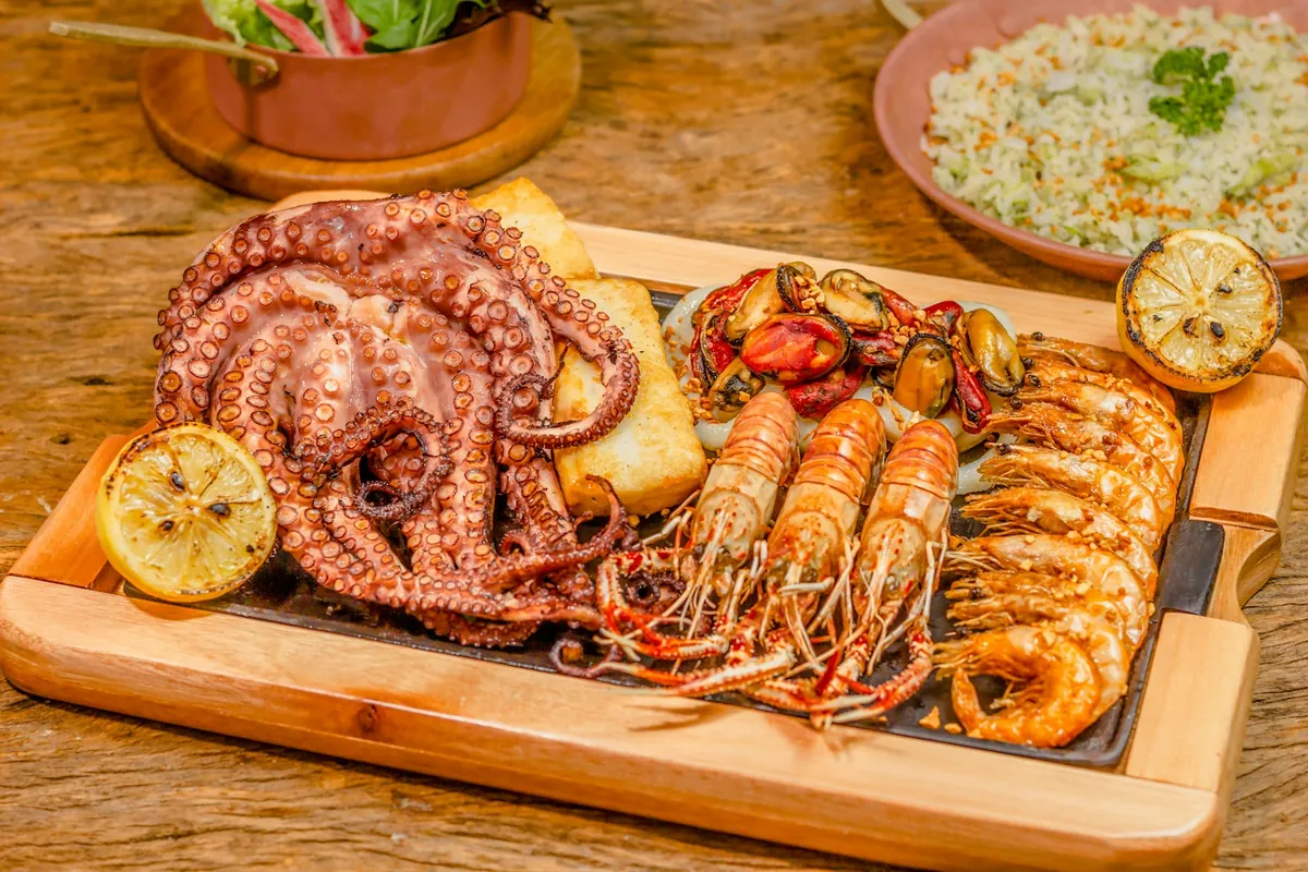 A dish combining several proteins with vegetables