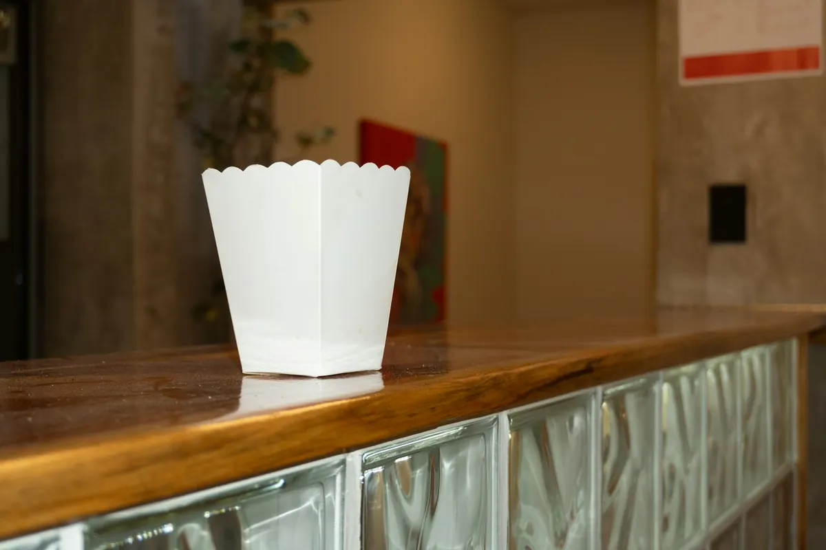 Several separate takeout containers on a table