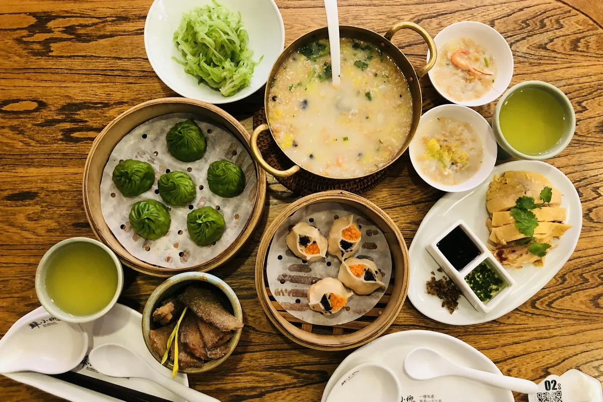 Noodle dishes set out on a table to share