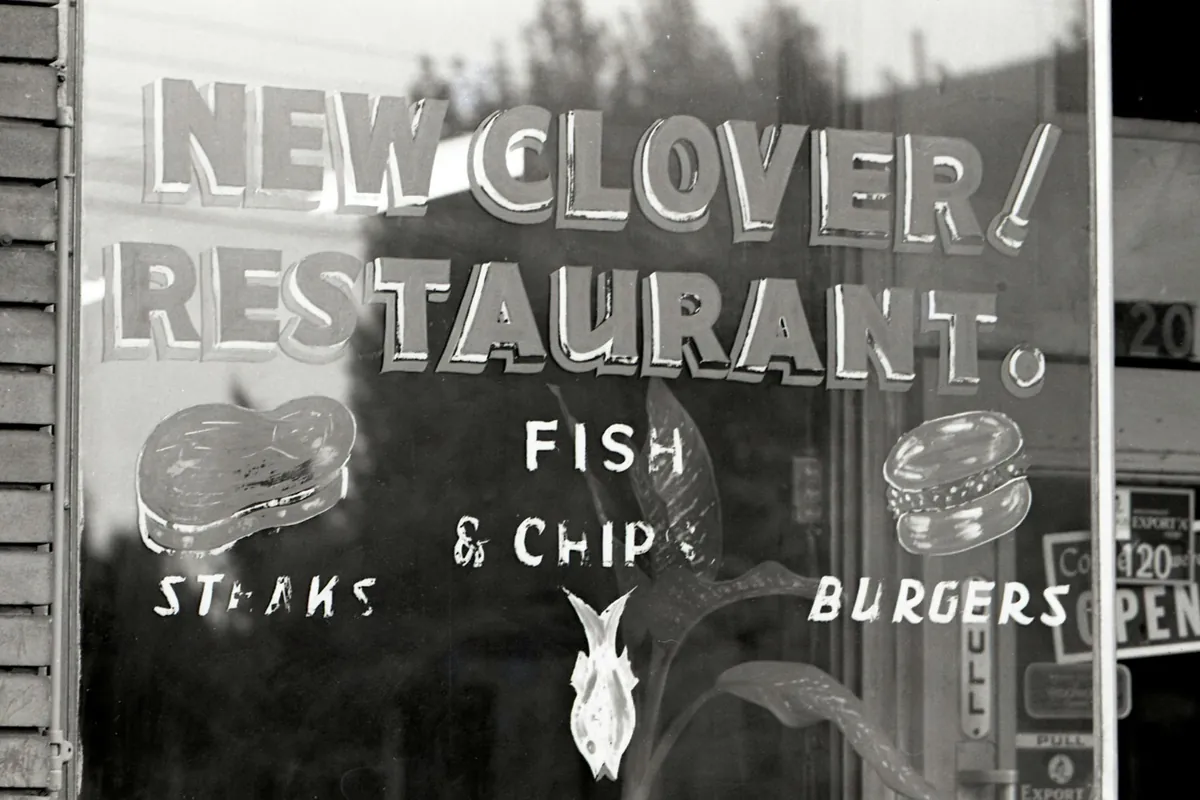 An open sign in a restaurant window