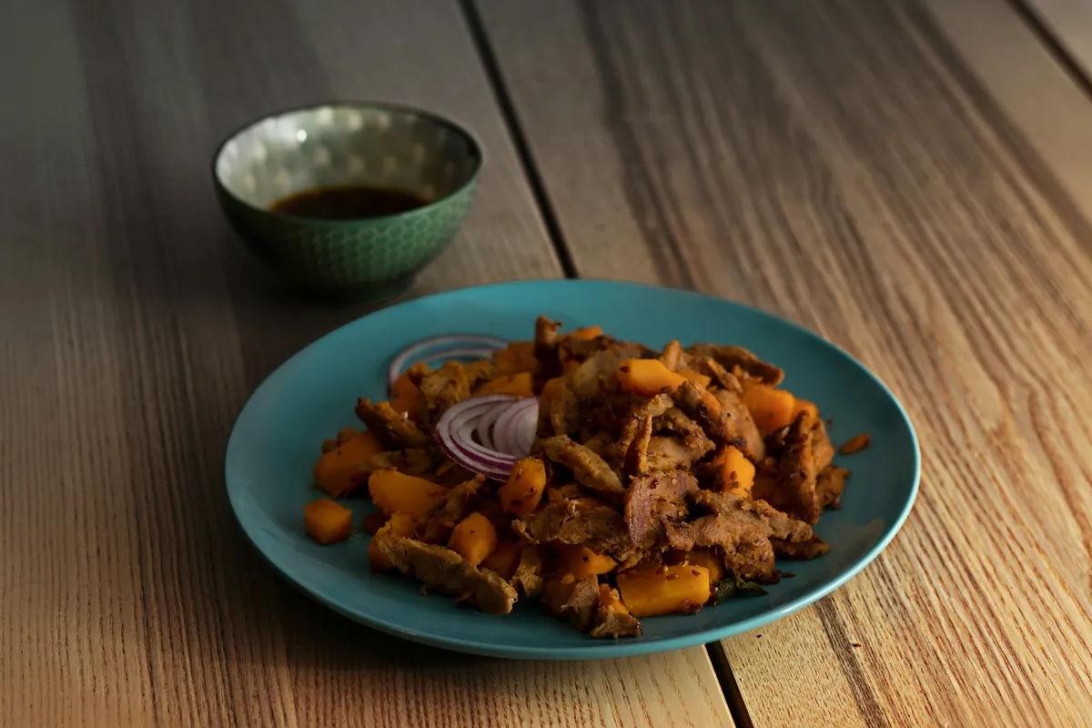 Fried rice with pieces of roast pork through it