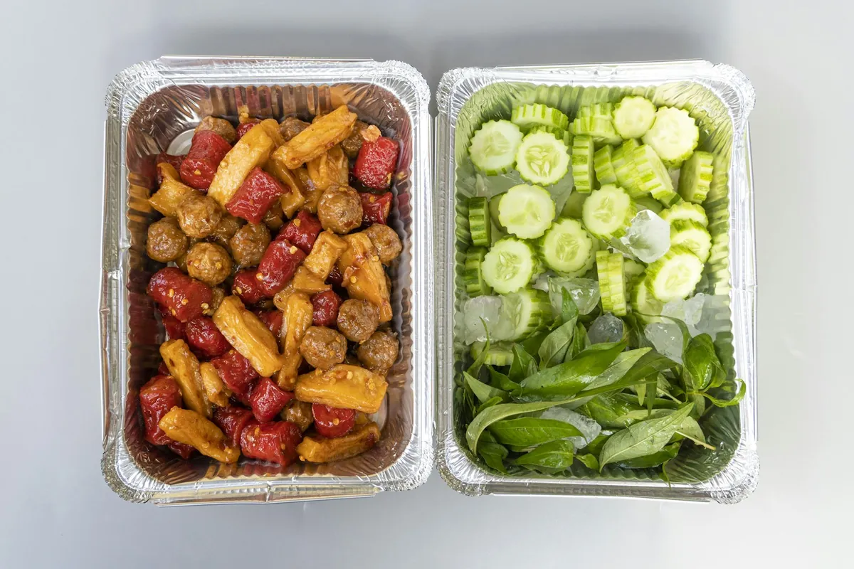 Prepared ingredients portioned into trays