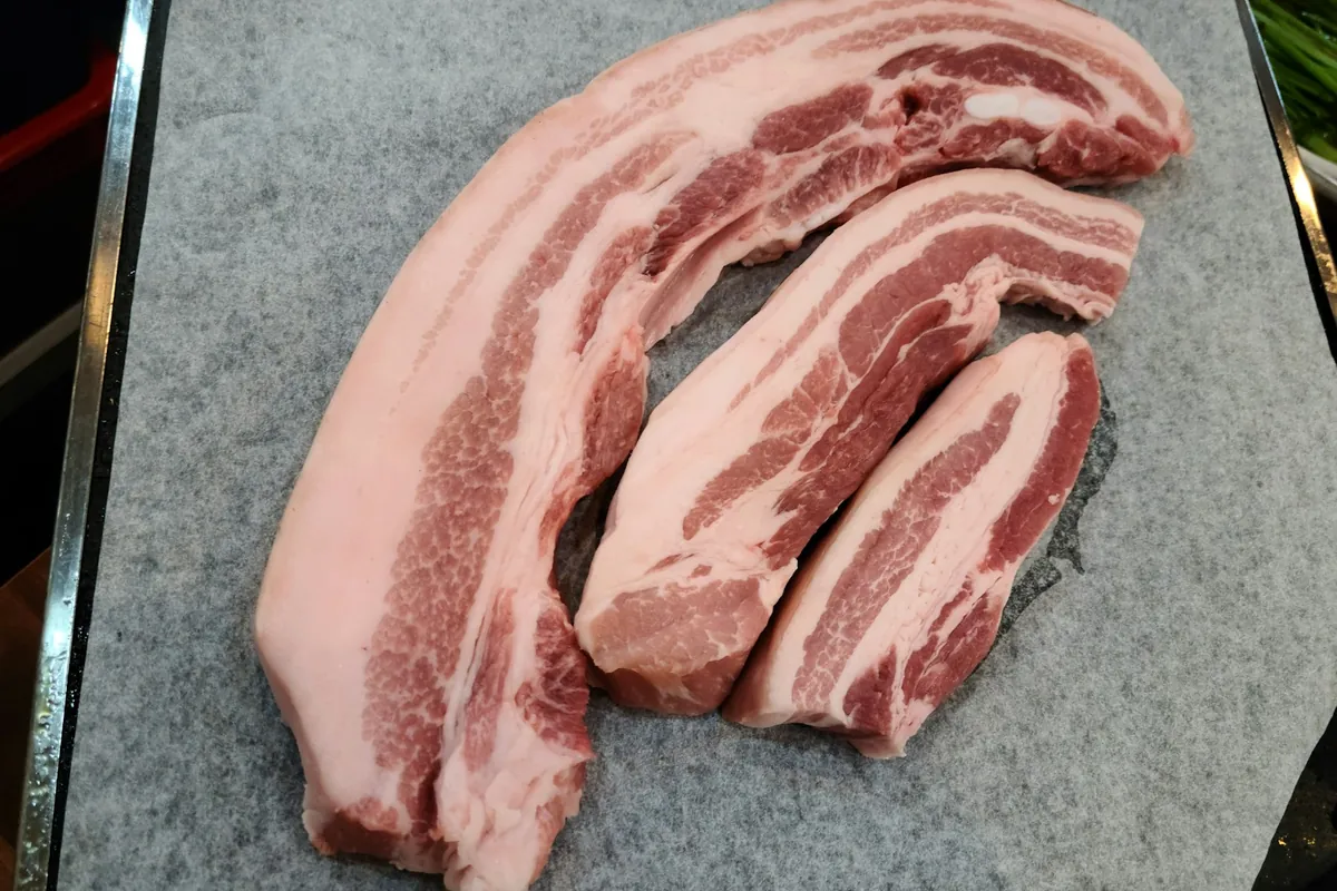 A rack of pork ribs before cooking
