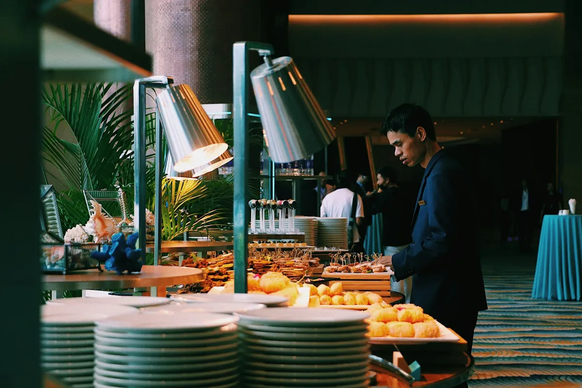 A tray being refilled at a buffet