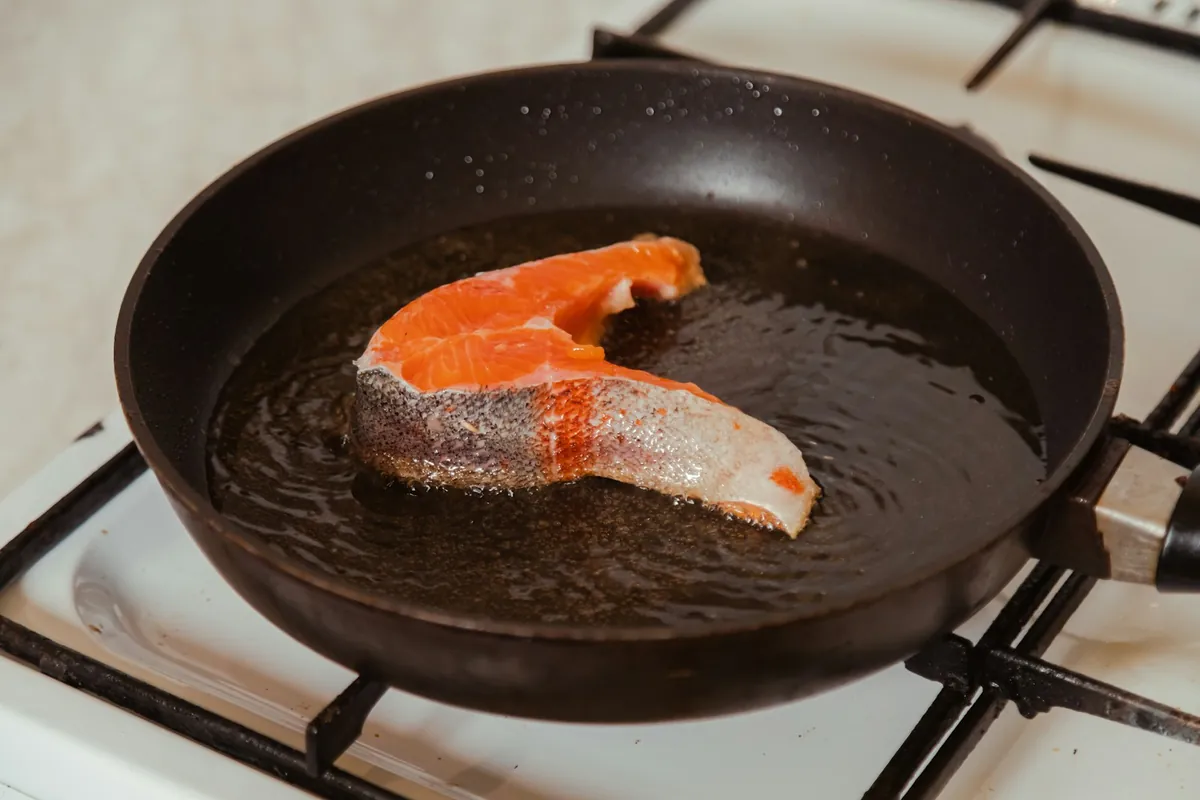 Fried rice being reheated in a hot pan