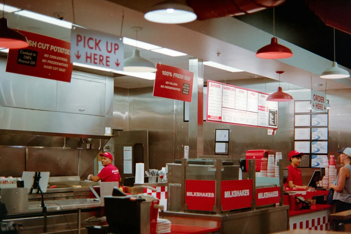 A takeout order waiting for collection at a restaurant counter