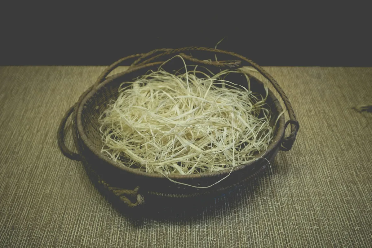 Plain rice served beside a sauced dish
