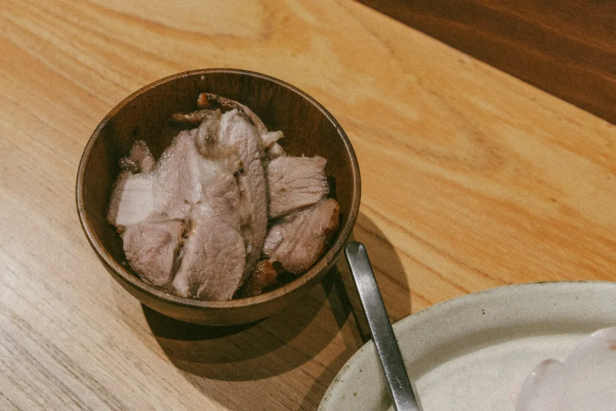 A piece of roasted pork ready for slicing
