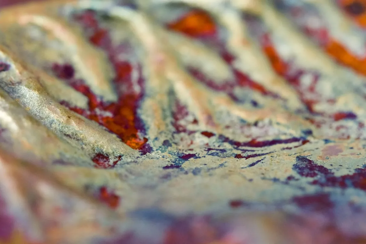 A sauced dish with oil separating on the surface