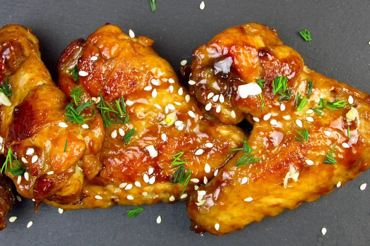 Glazed chicken finished with toasted sesame seeds