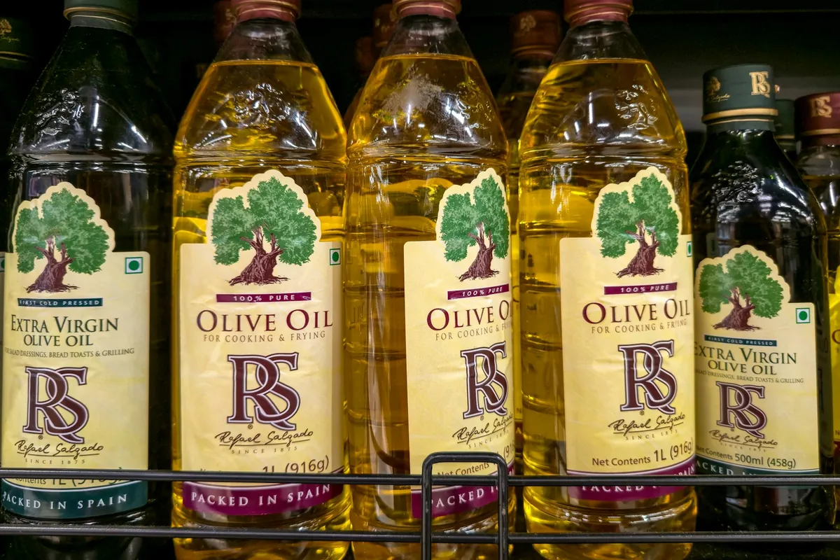 Several bottles of different cooking oils