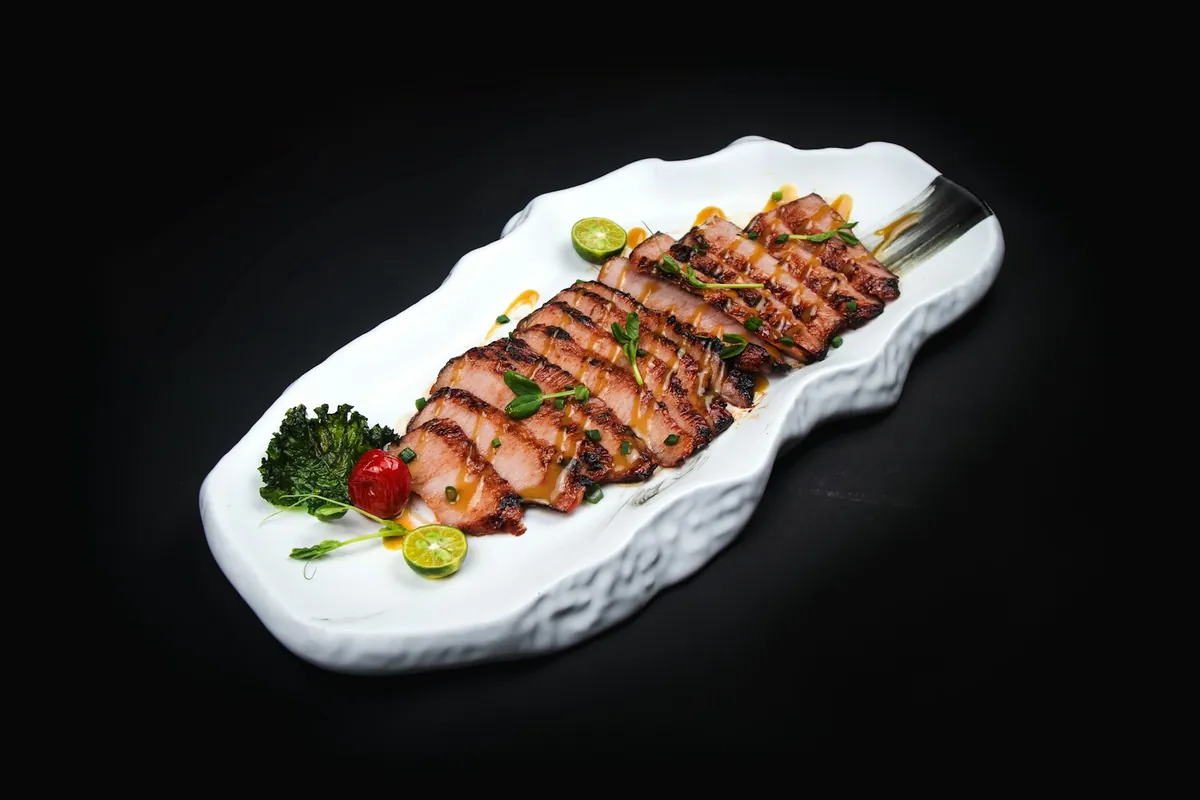 Sliced beef coated in a savory brown sauce