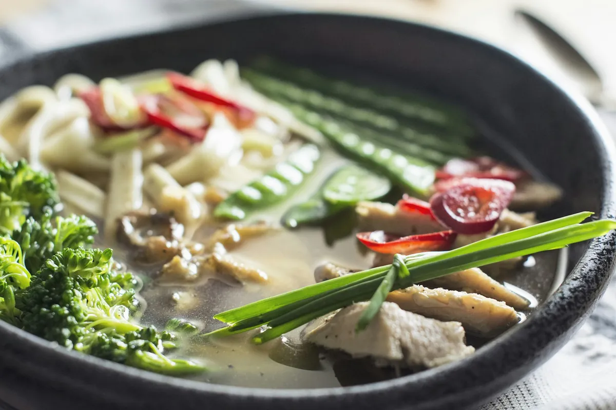 A bowl of Chinese soup served to start a meal