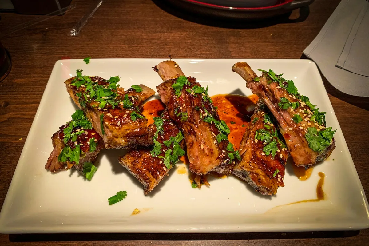 A special dish on a table alongside shared dishes