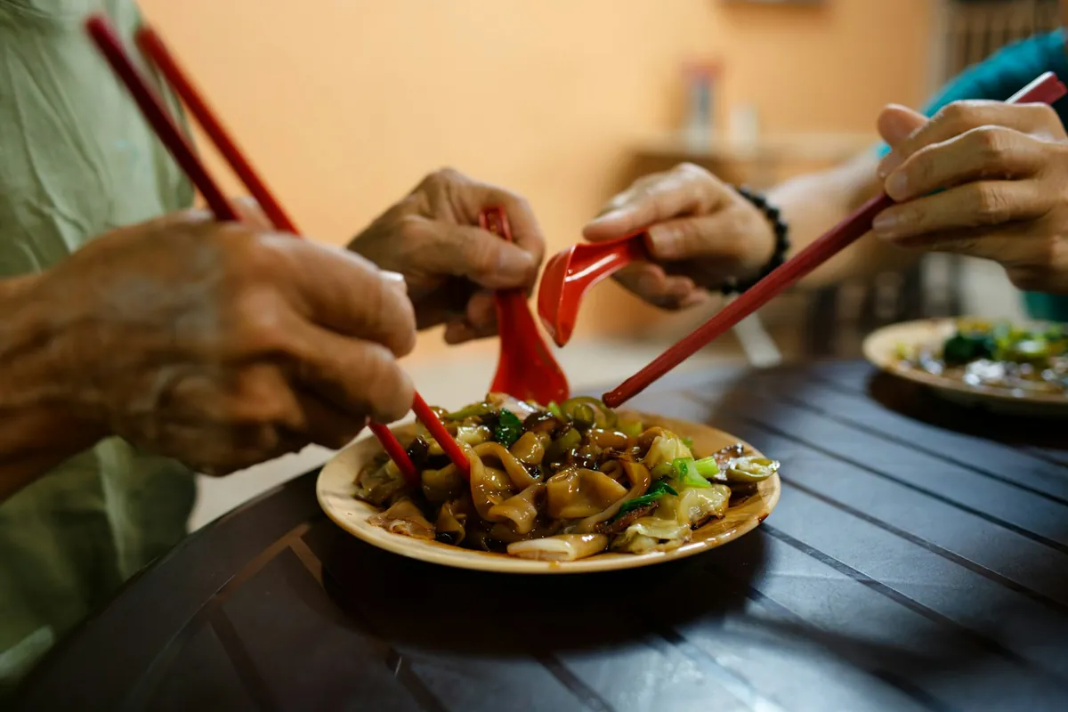 People sharing appetizers at a table